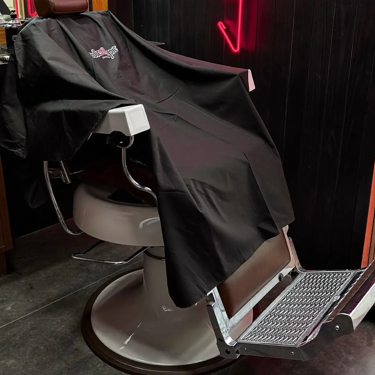 Barber chair with cape ready