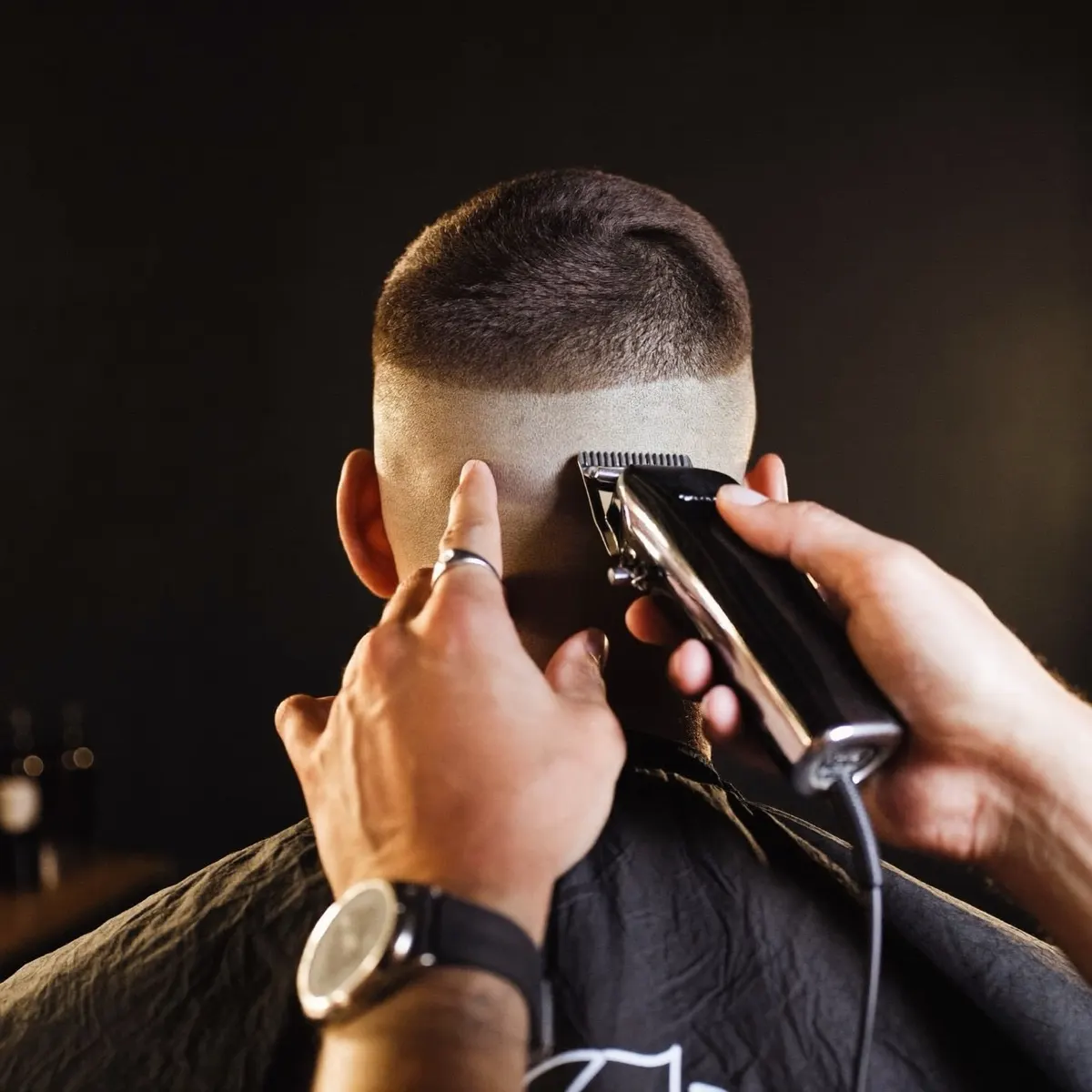 Skin fade, finished with a razor line-up